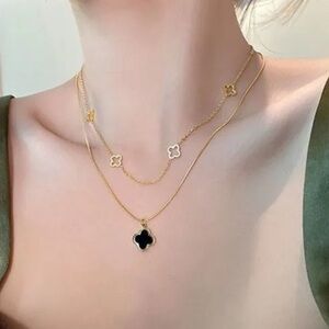 Elegant Gold and Black Clover Necklace. New Without Tags.